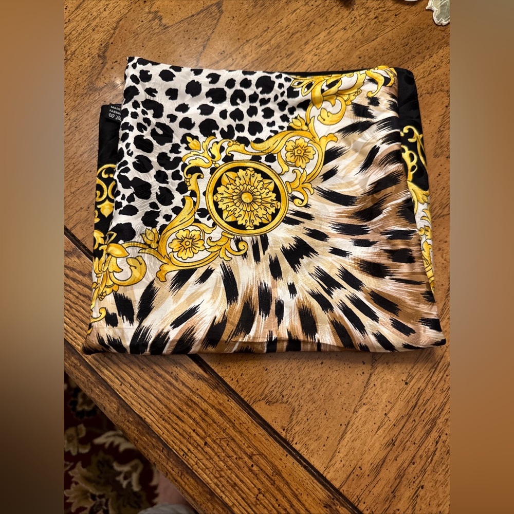 Italian silk scarf animal print gold & black background hundred percent silk
